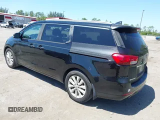 2016 Kia Sedona SX with VIN KNDMC5C15G6143818, listed as a IAAI auction lot 42051284 with 97,666 mi miles and . Bid and sale history available at carsss.com. Image 3.