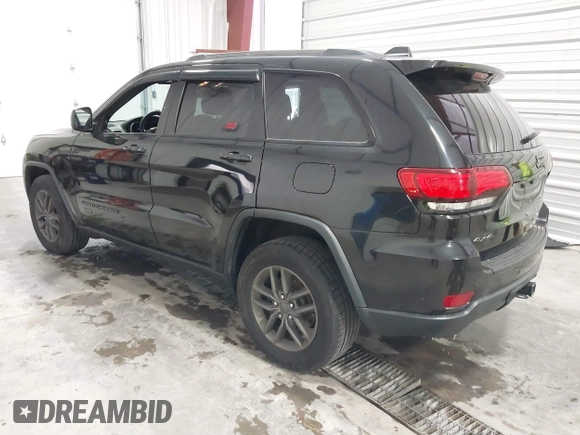 2016 Jeep Grand Cherokee 75th Anniversary z VIN 1C4RJFAG8GC476475, wystawiony jako IAAI lot #41509557 z przebiegiem 94 621 mil mil oraz . Historia ofert i sprzedaży dostępna na DreamBid. Obrazek 3.