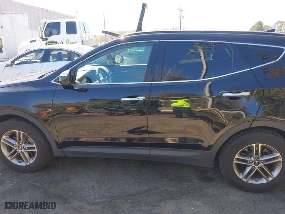 2017 Hyundai Santa Fe Sport 2.4L with VIN 5NMZUDLB8HH031962, listed as a IAAI auction lot 41862133 with 97,594 mi miles. Bid and sale history available at carsss.com. Image 14.