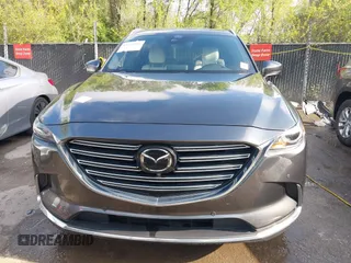 2020 Mazda CX-9 Signature with VIN JM3TCBEYXL0402053, listed as a IAAI auction lot 42070846 with 47,695 mi miles and . Bid and sale history available at DreamBid. Image 13.