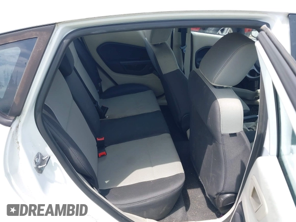 2013 Ford Fiesta S with VIN 3FADP4TJ4DM164594, listed as a IAAI auction lot 42154202 with 75,860 mi miles and . Bid and sale history available at DreamBid. Image 8.