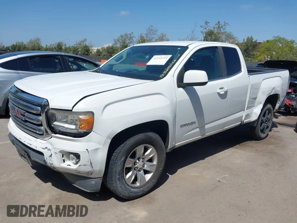 2015 GMC Canyon 2WD SLE z VIN 1GTH5BEA4F1239815, wystawiony jako IAAI lot #42135355 z przebiegiem 110 696 mil mil oraz . Historia ofert i sprzedaży dostępna na DreamBid. Obrazek 18.