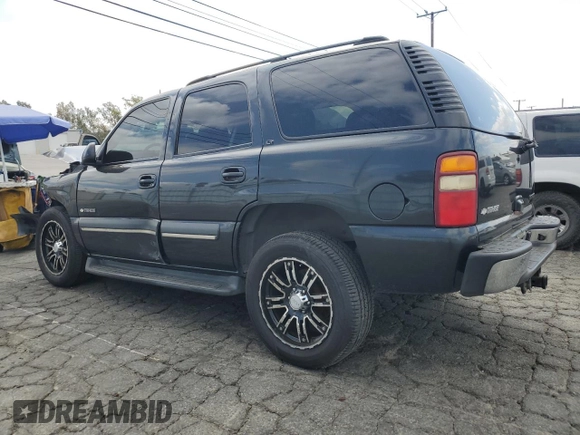 2003 Chevrolet Tahoe LT with VIN 1GNEC13TX3R293907, listed as a Copart auction lot 71849144 with 238,669 mi miles and Salvage Title. Bid and sale history available at carsss.com. Image 2.