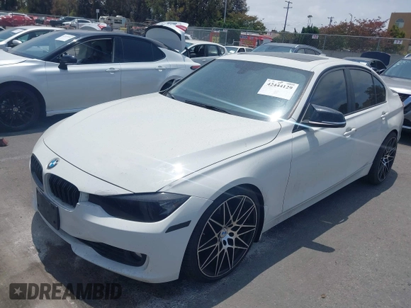 2014 BMW 3 Series 328i with VIN WBA3C1C52EK110753, listed as a IAAI auction lot 42444129 with 169,035 mi miles and . Bid and sale history available at DreamBid. Image 17.