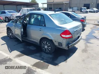 2009 Nissan Versa 1.8 S with VIN 3N1BC11E09L449780, listed as a IAAI auction lot 42034977 with 180,680 mi miles. Bid and sale history available at carsss.com. Image 3.