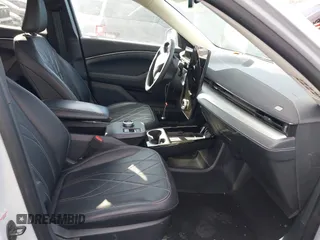 2022 Ford Mustang Mach-E Select z VIN 3FMTK1SS2NMA18639, wystawiony jako IAAI lot #41409332 z przebiegiem 8454 mil mil oraz . Historia ofert i sprzedaży dostępna na DreamBid. Obrazek 5.