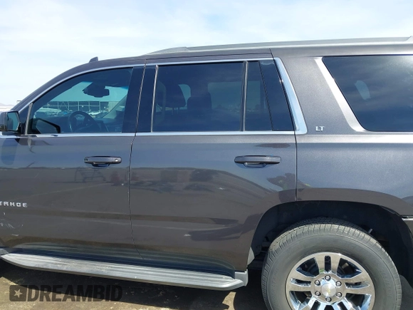 2017 Chevrolet Tahoe LT with VIN 1GNSCBKC5HR120345, listed as a IAAI auction lot 41988737 with 110,217 mi miles and . Bid and sale history available at DreamBid. Image 14.