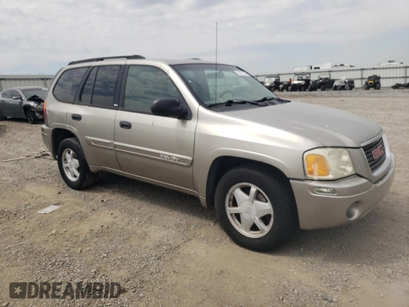 2003 GMC Envoy SLE z VIN 1GKDT13S332365071, wystawiony jako Copart lot #52811295 z przebiegiem Nie podano mil oraz Szkoda całkowita • Salvage title. Historia ofert i sprzedaży dostępna na DreamBid. Obrazek 4.