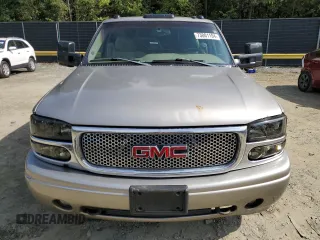 2003 GMC Sierra Denali z VIN 2GTFK69U831201215, wystawiony jako Copart lot #73801184 z przebiegiem 186 959 mil mil oraz Szkody całkowita. Historia ofert i sprzedaży dostępna na DreamBid. Obrazek 5.