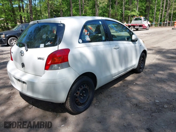 2010 Toyota Yaris with VIN JTDJT4K37A5287223, listed as a IAAI auction lot 42150919 with 196,064 mi miles. Bid and sale history available at carsss.com. Image 4.
