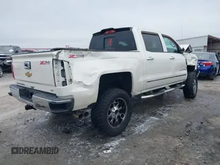 2014 Chevrolet Silverado 1500 LTZ with VIN 3GCUKSEJ3EG434991, listed as a IAAI auction lot 41385058 with 106,183 mi miles and . Bid and sale history available at DreamBid. Image 4.