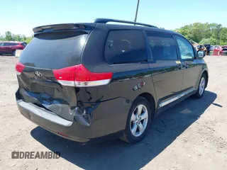 2014 Toyota Sienna LE AAS with VIN 5TDKK3DC6ES453200, listed as a IAAI auction lot 42277928 with 347,887 mi miles and . Bid and sale history available at DreamBid. Image 4.