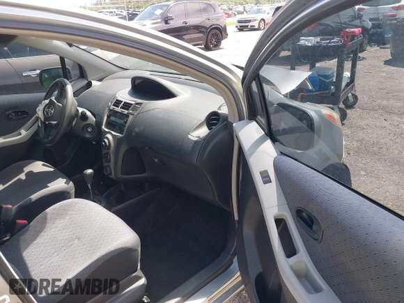 2010 Toyota Yaris with VIN JTDKT4K31A5318793, listed as a IAAI auction lot 39910045 with 192,737 mi miles. Bid and sale history available at carsss.com. Image 5.