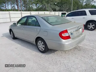 2004 Toyota Camry LE with VIN 4T1BE32K04U286257, listed as a IAAI auction lot 42079619 with 205,634 mi miles. Bid and sale history available at carsss.com. Image 3.