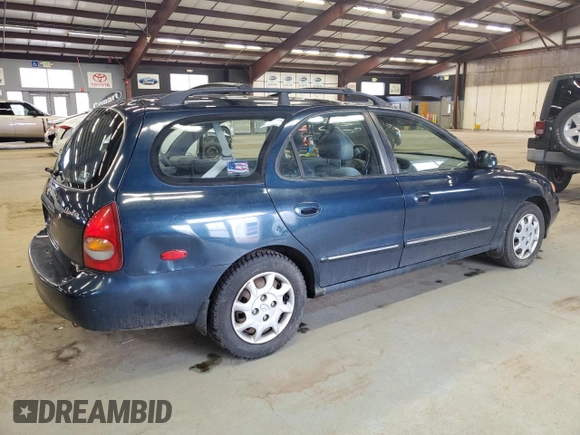 2000 Hyundai Elantra z VIN KMHJW35F5YU181324, wystawiony jako Copart lot #48016775 z przebiegiem 79 686 mil mil oraz Czysty tytuł • Clean title. Historia ofert i sprzedaży dostępna na DreamBid. Obrazek 3.