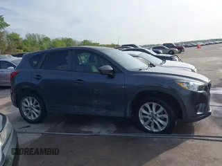 2014 Mazda CX-5 Grand Touring with VIN JM3KE2DY7E0345742, listed as a IAAI auction lot 41864116 with 158,746 mi miles. Bid and sale history available at carsss.com. Image 13.