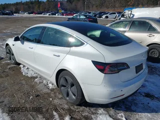 2019 Tesla Model 3 Long Range with VIN 5YJ3E1EBXKF452900, listed as a IAAI auction lot 41454947 with 93,277 mi miles. Bid and sale history available at carsss.com. Image 3.