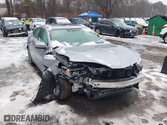 2019 Acura TLX with VIN 19UUB1F38KA009420, listed as a IAAI auction lot 41459987 with 102,336 mi miles. Bid and sale history available at carsss.com. Image 1.