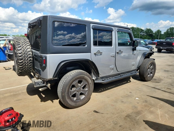 2016 Jeep Wrangler Unlimited Sahara with VIN 1C4BJWEG6GL168944, listed as a Copart auction lot 61650615 with 66,016 mi miles and Salvage title. Bid and sale history available at DreamBid. Image 3.