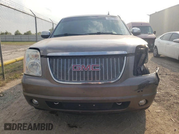 2011 GMC Yukon SLT with VIN 1GKS1CE07BR242495, listed as a Copart auction lot 66517644 with 219,344 mi miles and Salvage Title. Bid and sale history available at carsss.com. Image 5.