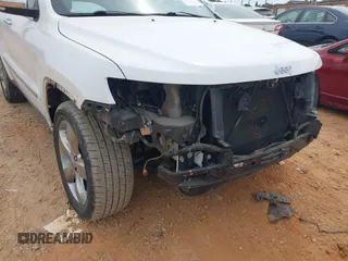 2013 Jeep Grand Cherokee Overland with VIN 1C4RJECGXDC621227, listed as a IAAI auction lot 42098042 with 194,232 mi miles and . Bid and sale history available at DreamBid. Image 6.