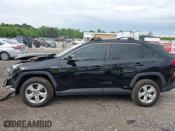 2021 Toyota RAV4 Hybrid XLE with VIN JTMRWRFV2MD133113, listed as a IAAI auction lot 42087394 with 103,019 mi miles and . Bid and sale history available at DreamBid. Image 14.