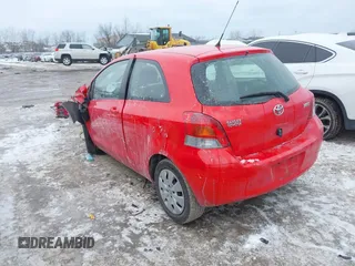 2011 Toyota Yaris with VIN JTDJT4K34B5329980, listed as a IAAI auction lot 41393540 with 84,987 mi miles. Bid and sale history available at carsss.com. Image 3.