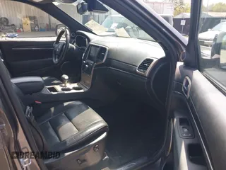 2014 Jeep Grand Cherokee Summit с VIN 1C4RJEJGXEC299600, выставлен на аукционе IAAI как лот 41935193 с пробегом 199 831 миль миль и . История ставок и продаж доступна на DreamBid. Изображение 5.