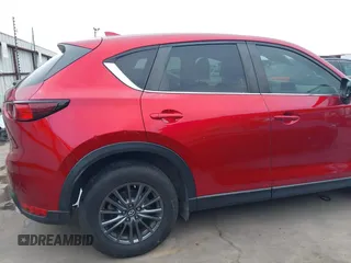 2019 Mazda CX-5 Touring with VIN JM3KFACM7K0696815, listed as a IAAI auction lot 41921763 with 46,900 mi miles. Bid and sale history available at carsss.com. Image 19.