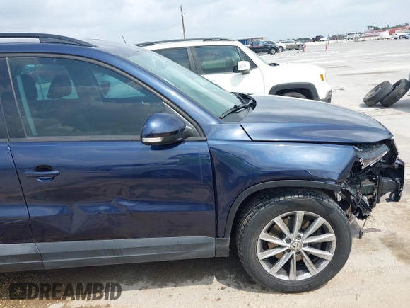 2015 Volkswagen Tiguan SE with VIN WVGAV7AX1FW508313, listed as a IAAI auction lot 42120704 with 136,405 mi miles and . Bid and sale history available at DreamBid. Image 6.