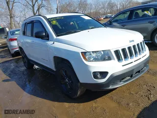 2015 Jeep Compass Sport with VIN 1C4NJDBB0FD147803, listed as a IAAI auction lot 41661497 with 135,913 mi miles. Bid and sale history available at carsss.com. Image 1.