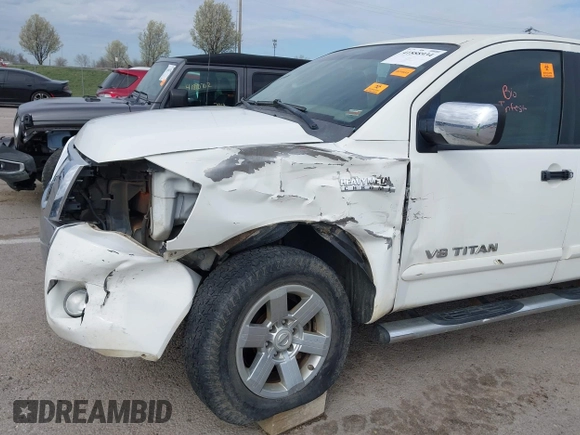 2011 Nissan Titan SL with VIN 1N6AA0EC7BN313599, listed as a IAAI auction lot 41888934 with 182,894 mi miles. Bid and sale history available at carsss.com. Image 6.