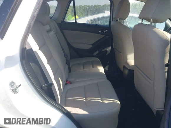 2014 Mazda CX-5 Grand Touring with VIN JM3KE2DY1E0424890, listed as a IAAI auction lot 42052437 with 107,793 mi miles. Bid and sale history available at carsss.com. Image 8.