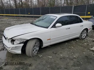 2004 Jaguar XJ 8 with VIN SAJWA71C34SG26102, listed as a Copart auction lot 51380925 with 113,057 mi miles and Salvage title. Bid and sale history available at DreamBid. Image 1.