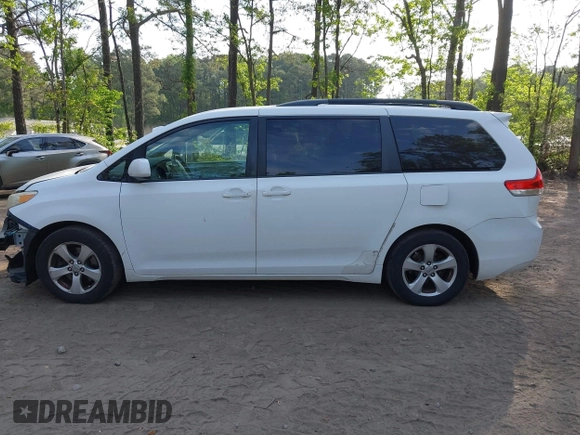 2011 Toyota Sienna LE AAS with VIN 5TDKK3DC5BS074247, listed as a IAAI auction lot 42096751 with 241,555 mi miles. Bid and sale history available at carsss.com. Image 14.