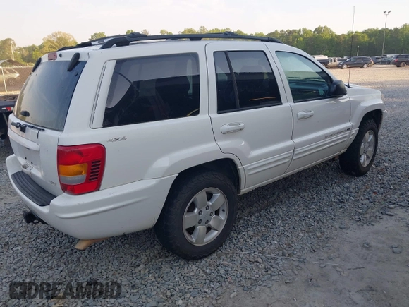 2001 Jeep Grand Cherokee Limited with VIN 1J4GW58N71C506901, listed as a IAAI auction lot 42079198 with Not Provided miles and . Bid and sale history available at DreamBid. Image 4.