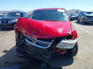 2015 Dodge Journey SE z VIN 3C4PDCAB9FT587668, wystawiony jako IAAI lot #41868556 z przebiegiem 99 695 mil mil oraz . Historia ofert i sprzedaży dostępna na DreamBid. Obrazek 6.