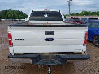 2014 Ford F-150 XL with VIN 1FTMF1CM7EFC60291, listed as a IAAI auction lot 42503556 with 215,474 mi miles and . Bid and sale history available at DreamBid. Image 16.