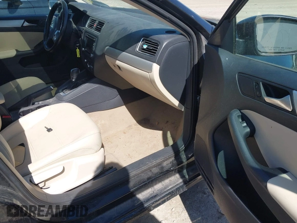2012 Volkswagen Jetta TDI w/Premium & Nav z VIN 3VWLL7AJ7CM400382, wystawiony jako IAAI lot #42274839 z przebiegiem 150 205 mil mil oraz . Historia ofert i sprzedaży dostępna na DreamBid. Obrazek 5.