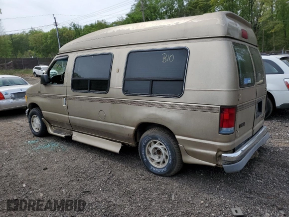 1999 Ford Econoline Cargo with VIN 1FDRE14W5XHB75137, listed as a Copart auction lot 53663605 with 147,149 mi miles and Salvage Title. Bid and sale history available at carsss.com. Image 2.
