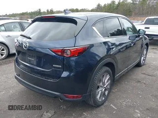 2020 Mazda CX-5 Grand Touring with VIN JM3KFBDM7L1723852, listed as a IAAI auction lot 41848152 with 85,099 mi miles. Bid and sale history available at carsss.com. Image 4.