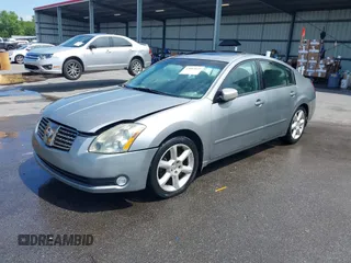 2004 Nissan Maxima SE with VIN 1N4BA41EX4C881792, listed as a IAAI auction lot 42083849 with 166,034 mi miles. Bid and sale history available at carsss.com. Image 2.