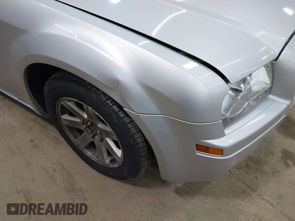 2006 Chrysler 300 with VIN 2C3LA43R06H417610, listed as a IAAI auction lot 42157332 with 202,364 mi miles and . Bid and sale history available at DreamBid. Image 6.