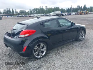 2012 Hyundai Veloster w/Gray Int with VIN KMHTC6AD4CU062034, listed as a IAAI auction lot 42371790 with 116,861 mi miles and . Bid and sale history available at DreamBid. Image 4.