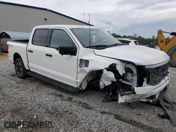 2023 Ford F-150 Lightning Pro z VIN 1FTVW1ELXPWG63466, wystawiony jako Copart lot #59163895 z przebiegiem Nie podano mil oraz Szkody całkowita. Historia ofert i sprzedaży dostępna na DreamBid. Obrazek 4.