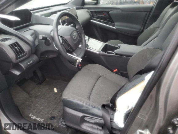 2023 Toyota bZ4X XLE with VIN JTMABACA8PA040484, listed as a Copart auction lot 51410705 with 9,807 mi miles and Salvage Title. Bid and sale history available at DreamBid. Image 7.