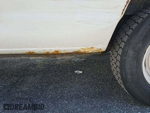 2010 Ford Econoline Cargo Commercial with VIN 1FTNE1EWXADA91296, listed as a IAAI auction lot 42571036 with 154,626 mi miles and . Bid and sale history available at DreamBid. Image 37.