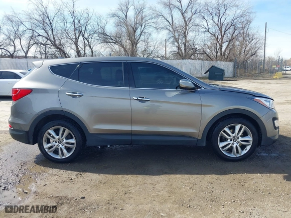 2013 Hyundai Santa Fe 2.0T Sport with VIN 5XYZWDLA1DG003779, listed as a IAAI auction lot 41761431 with 127,895 mi miles. Bid and sale history available at carsss.com. Image 13.