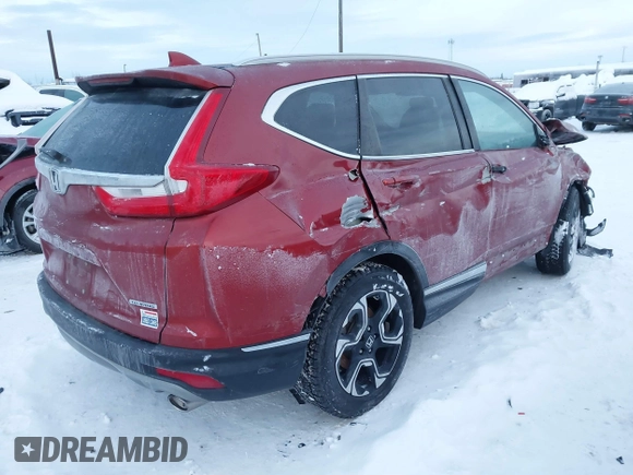 2018 Honda CR-V Touring with VIN 5J6RW1H95JL006062, listed as a IAAI auction lot 41072002 with 50,930 mi miles and . Bid and sale history available at DreamBid. Image 4.