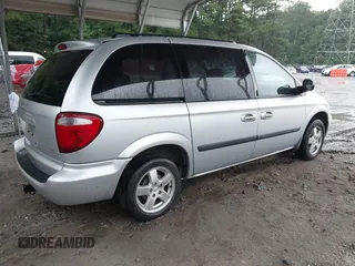 2005 Dodge Caravan SXT with VIN 1D4GP45RX5B289704, listed as a IAAI auction lot 42758561 with 110,396 mi miles and . Bid and sale history available at DreamBid. Image 4.